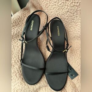 Express size 9 black heels. Brand new, never worn.